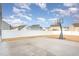 Large backyard with basketball goal and concrete patio at 79 Stallion Way, Benson, NC 27504