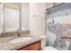 Simple bathroom with granite countertop and shower at 79 Stallion Way, Benson, NC 27504