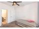 Cozy bedroom featuring carpet flooring and an ensuite bathroom at 79 Stallion Way, Benson, NC 27504