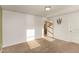 Bright bedroom with carpet flooring and an access to the hallway at 79 Stallion Way, Benson, NC 27504