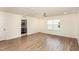Spacious bonus room with hardwood floors and access to a small bathroom at 79 Stallion Way, Benson, NC 27504