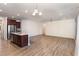 Eat-in kitchen with island, stainless steel appliances, and hardwood floors at 79 Stallion Way, Benson, NC 27504