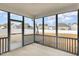 Screened porch with backyard view and access to the home at 79 Stallion Way, Benson, NC 27504