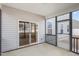 Screened porch with sliding glass doors leading to the backyard at 79 Stallion Way, Benson, NC 27504