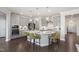 Modern kitchen featuring a large island and stainless steel appliances at 909 Jasper Mine Trl # 740 Galvani, Raleigh, NC 27610