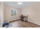 Home office with wood flooring and a window offering natural light at 1329 Wrentree Cir, Raleigh, NC 27610