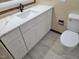 Bathroom with white vanity and marble countertop at 1815 Bethlehem Rd, Rocky Mount, NC 27803