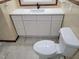 Updated bathroom with a white vanity and new toilet at 1815 Bethlehem Rd, Rocky Mount, NC 27803