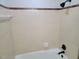 Bathroom with beige tile and a shower/tub combo at 1815 Bethlehem Rd, Rocky Mount, NC 27803
