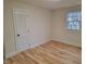 Spacious bedroom with hardwood floors and a closet at 1815 Bethlehem Rd, Rocky Mount, NC 27803