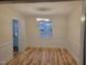 Bright dining room with hardwood floors and wainscoting at 1815 Bethlehem Rd, Rocky Mount, NC 27803
