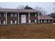 Brick ranch house with attached garage and large yard at 1815 Bethlehem Rd, Rocky Mount, NC 27803