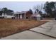 House with attached garage and driveway at 1815 Bethlehem Rd, Rocky Mount, NC 27803