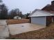 Attached garage with gray door at 1815 Bethlehem Rd, Rocky Mount, NC 27803