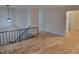 Bright and airy living room featuring hardwood floors and a neutral color palette at 1815 Bethlehem Rd, Rocky Mount, NC 27803