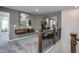 Loft area with exercise equipment and built-in shelving at 391 Fosterton Cottage Way, Raleigh, NC 27603