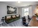 Home office with a large desk and comfortable seating at 391 Fosterton Cottage Way, Raleigh, NC 27603