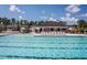 Resort-style community pool with plenty of lounge chairs at 393 Fosterton Cottage Way, Raleigh, NC 27603