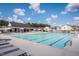 Inviting community pool with lounge chairs and a pool house at 393 Fosterton Cottage Way, Raleigh, NC 27603