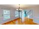 Bright dining room with hardwood floors and chandelier at 44 Wolf Creek Dr, Wendell, NC 27591