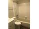 Bathroom with tub shower and toilet at 4600 Millstone Dr # D, Raleigh, NC 27604
