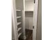 Walk-in closet with shelving and hanging rod at 4600 Millstone Dr # D, Raleigh, NC 27604