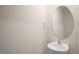 Simple bathroom with a white sink and oval mirror at 510 Fife Ct, Gibsonville, NC 27249