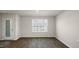 Spacious bonus room with large window and hardwood floors at 510 Fife Ct, Gibsonville, NC 27249