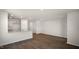 Open living room with hardwood floors and kitchen views at 510 Fife Ct, Gibsonville, NC 27249