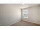 Simple bedroom with carpeted floor and window at 514 Fife Ct, Gibsonville, NC 27249