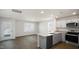 Open living room with access to patio and kitchen at 514 Fife Ct, Gibsonville, NC 27249