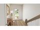 Bright and airy entryway with wood floors and a view to backyard at 700 Portia Way, Homesite 17, Morrisville, NC 27560