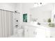Clean bathroom with a shower/tub combo and white vanity at 702 Portia Way, Homesite 16, Morrisville, NC 27560