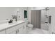 Simple bathroom with a tub, toilet and vanity at 702 Portia Way, Homesite 16, Morrisville, NC 27560