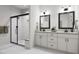 Double vanity bathroom with frameless shower at 704 Portia Way, Homesite 15, Morrisville, NC 27560