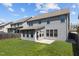 Two-story house with gray siding and a sunroom at 1022 Laredo Ln, Durham, NC 27703