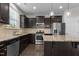 Modern kitchen with stainless steel appliances and an island at 1022 Laredo Ln, Durham, NC 27703