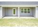 Covered patio with concrete flooring and access from the house at 104 Newport Landing Lndg # 100, Garner, NC 27529