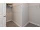Spacious walk-in closet with wire shelving at 104 Newport Landing Lndg # 100, Garner, NC 27529