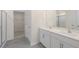 Bathroom boasts double vanity and walk-in shower at 1129 Middlecrest Dr, Rocky Mount, NC 27804