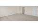 Spacious bedroom with carpeted floor and bathroom access at 1129 Middlecrest Dr, Rocky Mount, NC 27804