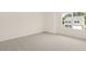 Spacious bedroom with a view and neutral decor at 1129 Middlecrest Dr, Rocky Mount, NC 27804