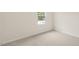 Bedroom with large window and neutral decor at 1129 Middlecrest Dr, Rocky Mount, NC 27804