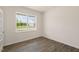 Bright home office features wood-look floors and a large window at 1129 Middlecrest Dr, Rocky Mount, NC 27804