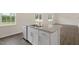 Kitchen island with granite countertop and stainless steel dishwasher at 1129 Middlecrest Dr, Rocky Mount, NC 27804