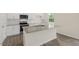 Modern kitchen with granite countertops and stainless steel appliances at 1129 Middlecrest Dr, Rocky Mount, NC 27804