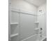 Clean bathroom with built-in shelves and bathtub at 1230 Middlecrest Dr, Rocky Mount, NC 27804