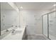 Modern bathroom with double vanity and glass shower at 1230 Middlecrest Dr, Rocky Mount, NC 27804