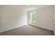 Simple bedroom with window and carpet flooring at 1230 Middlecrest Dr, Rocky Mount, NC 27804