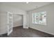Spacious home office with wood-look floors and large window at 1230 Middlecrest Dr, Rocky Mount, NC 27804